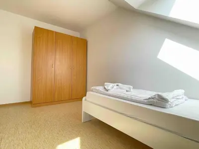 Ein Bett oder Betten in einem Zimmer der Unterkunft STA1067 Moderne Monteurwohnung mit Balkon