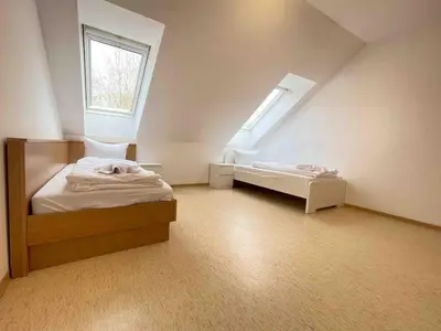 Ein Bett oder Betten in einem Zimmer der Unterkunft STA1079 Moderne Monteurwohnung mit Balkon