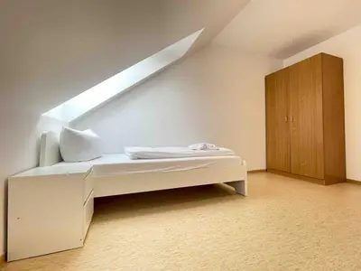 Ein Bett oder Betten in einem Zimmer der Unterkunft STA1079 Moderne Monteurwohnung mit Balkon