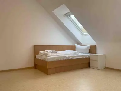 Ein Bett oder Betten in einem Zimmer der Unterkunft STA1079 Moderne Monteurwohnung mit Balkon