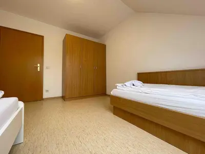 Ein Bett oder Betten in einem Zimmer der Unterkunft STA1079 Moderne Monteurwohnung mit Balkon