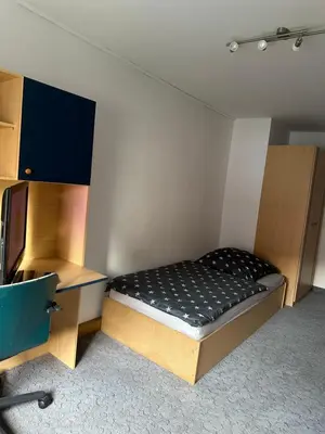 Ein Bett oder Betten in einem Zimmer der Unterkunft 2 Raum Ferienwohnung mit 2 Schlafzimmer