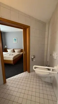 Ein Badezimmer in der Unterkunft Sparta Hotel