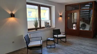Ein Sitzbereich in der Unterkunft Ferienwohnung am Perlenbach