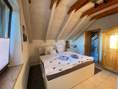 Ein Bett oder Betten in einem Zimmer der Unterkunft FICHTELRAUM Dein Raum im Fichtelgebirge