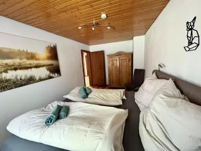 Ein Bett oder Betten in einem Zimmer der Unterkunft FICHTELRAUM Dein Raum im Fichtelgebirge