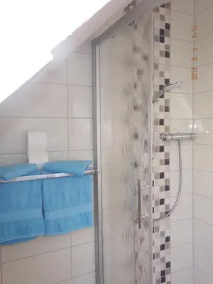 Ein Badezimmer in der Unterkunft Ferienvermietung Engelstädter