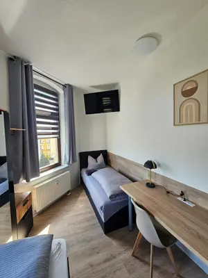 Ein Sitzbereich in der Unterkunft Westend 3