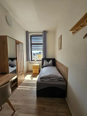 Ein Bett oder Betten in einem Zimmer der Unterkunft Westend 3