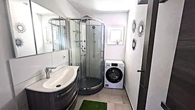 Ein Badezimmer in der Unterkunft Ferienhaus Ferienwohnung Schöneberg