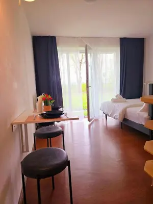 Ein Bett oder Betten in einem Zimmer der Unterkunft Elahs Nod