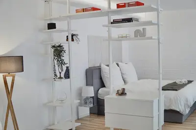Ein Bett oder Betten in einem Zimmer der Unterkunft Garden Luxus Apartment