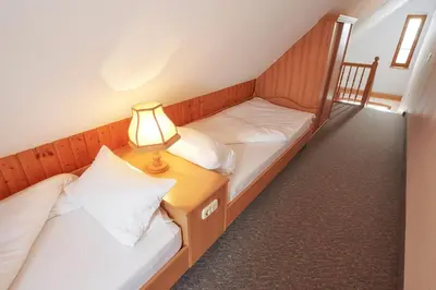 Ein Bett oder Betten in einem Zimmer der Unterkunft Ferienappartements Rausch
