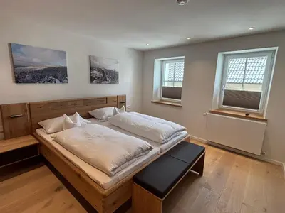 Ein Bett oder Betten in einem Zimmer der Unterkunft Fichtellofts