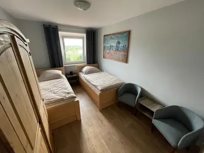 Ein Bett oder Betten in einem Zimmer der Unterkunft Ferienwohnung Stadthaus Cham