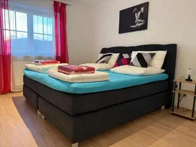 Ein Bett oder Betten in einem Zimmer der Unterkunft Residenz Göttersitz