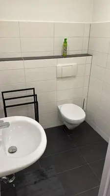 Ein Badezimmer in der Unterkunft World of Esport