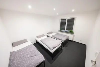 Ein Bett oder Betten in einem Zimmer der Unterkunft World of Esport