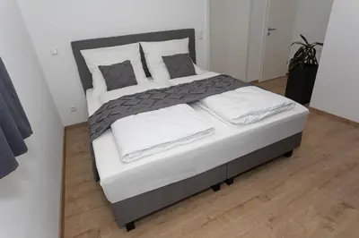Ein Bett oder Betten in einem Zimmer der Unterkunft FeWo Wurz