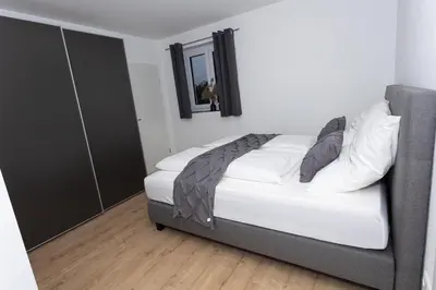 Ein Bett oder Betten in einem Zimmer der Unterkunft FeWo Wurz