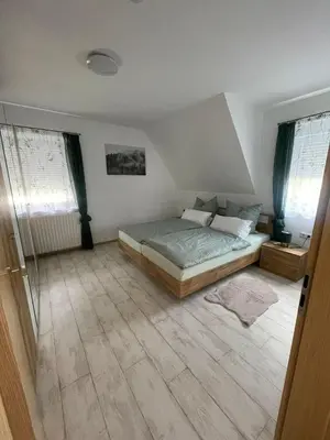 Ein Bett oder Betten in einem Zimmer der Unterkunft Country Style meets Modern