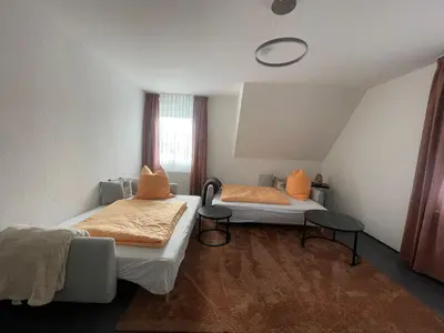 Ein Bett oder Betten in einem Zimmer der Unterkunft Country Style meets Modern