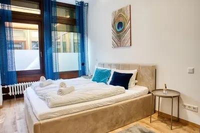 Ein Bett oder Betten in einem Zimmer der Unterkunft Urban Suite