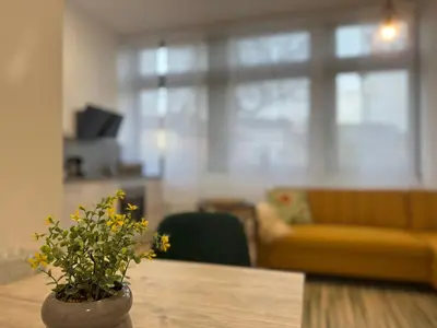 Ein Sitzbereich in der Unterkunft City Base