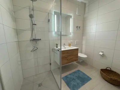 Ein Badezimmer in der Unterkunft City Base