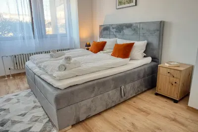 Ein Bett oder Betten in einem Zimmer der Unterkunft TheFamilyNest