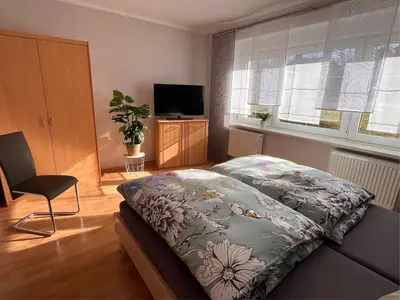 Ein Bett oder Betten in einem Zimmer der Unterkunft Ferienwohnung Hagert - Ankommen und Wohlfühlen