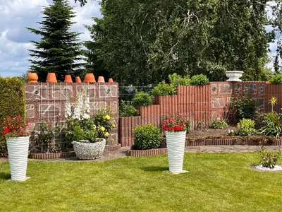 Ein Garten an der Unterkunft Ferienwohnung Hagert - Ankommen und Wohlfühlen