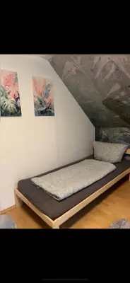 Ein Bett oder Betten in einem Zimmer der Unterkunft Casa Frida- Charmante Wohnung mit Parkplatz nähe Bayreuth