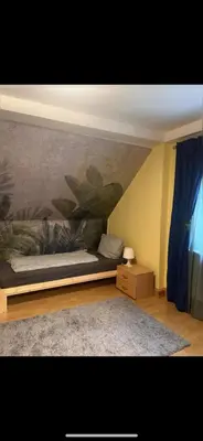 Ein Bett oder Betten in einem Zimmer der Unterkunft Casa Frida- Charmante Wohnung mit Parkplatz nähe Bayreuth