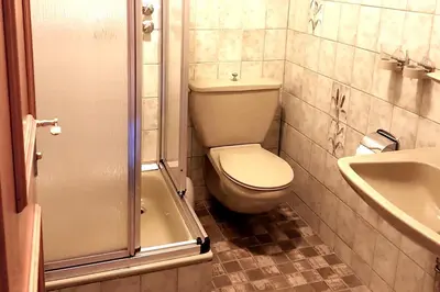 Ein Badezimmer in der Unterkunft Geräumige Ferienwohnung inmitten der Natur
