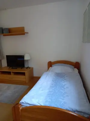 Ein Bett oder Betten in einem Zimmer der Unterkunft Goldsteig 2 -Zweibettzimmer