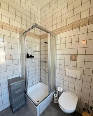 Ein Badezimmer in der Unterkunft Direkt am Freizeitpark Plohn by Immo Franzi