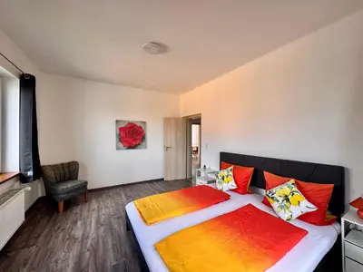 Ein Bett oder Betten in einem Zimmer der Unterkunft Ferienwohnung Hubertus