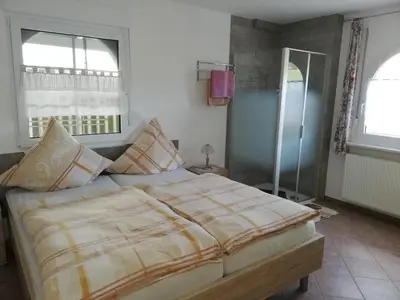 Ein Bett oder Betten in einem Zimmer der Unterkunft Villa Lindenpark