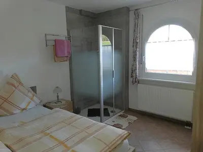 Ein Bett oder Betten in einem Zimmer der Unterkunft Villa Lindenpark