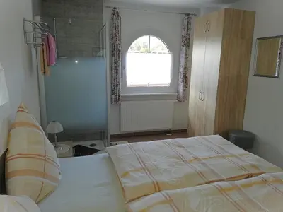 Ein Bett oder Betten in einem Zimmer der Unterkunft Villa Lindenpark