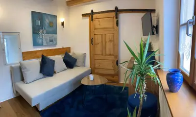 Ein Bett oder Betten in einem Zimmer der Unterkunft Falkner Turm