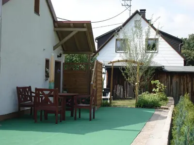 Ein Garten an der Unterkunft Haus Steinwaldblick