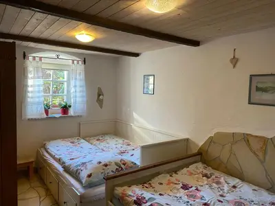 Ein Bett oder Betten in einem Zimmer der Unterkunft Ferienwohnung Kelch
