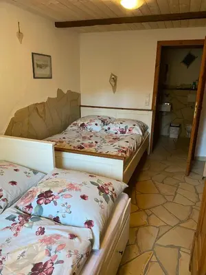Ein Bett oder Betten in einem Zimmer der Unterkunft Ferienwohnung Kelch