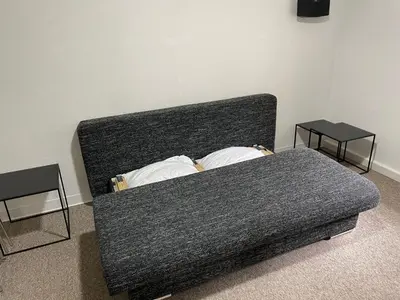 Ein Bett oder Betten in einem Zimmer der Unterkunft NOstalgie - Perle PLAUEN-ZENTRUM & S-BAHN Nähe für bis zu 6 Personen im EG, sehr ruhige Lage & EBK & PKW-Stellplatz