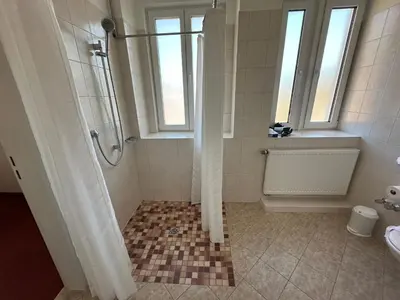 Ein Badezimmer in der Unterkunft GER-Haus