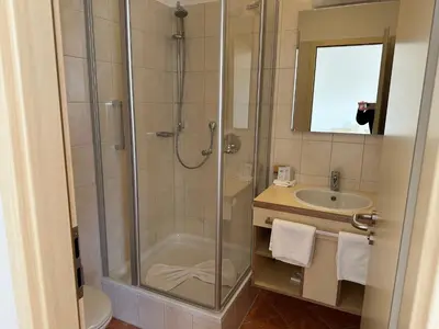 Ein Badezimmer in der Unterkunft GER-Haus