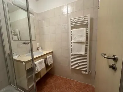 Ein Badezimmer in der Unterkunft GER-Haus