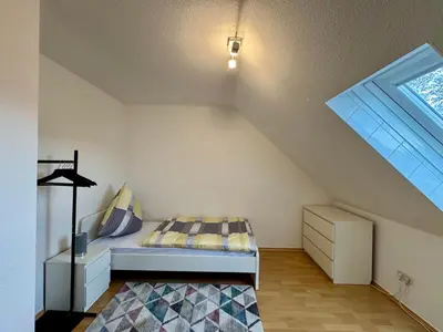 Ein Bett oder Betten in einem Zimmer der Unterkunft Bergjuwel mit Ruhe & Komfort - M20 - Frankenwald Apartments